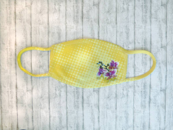 Hübsche Behelfsmaske/Alltagsmaske mit Orchideen-Motiv